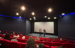 Cathy Charlwood and Professor Musselwhite on stage at the theatre